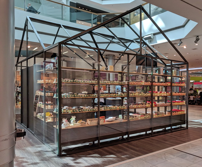Concept Store wie Gewächshaus in Mall von Einkaufszentrum Ansicht von Aussen